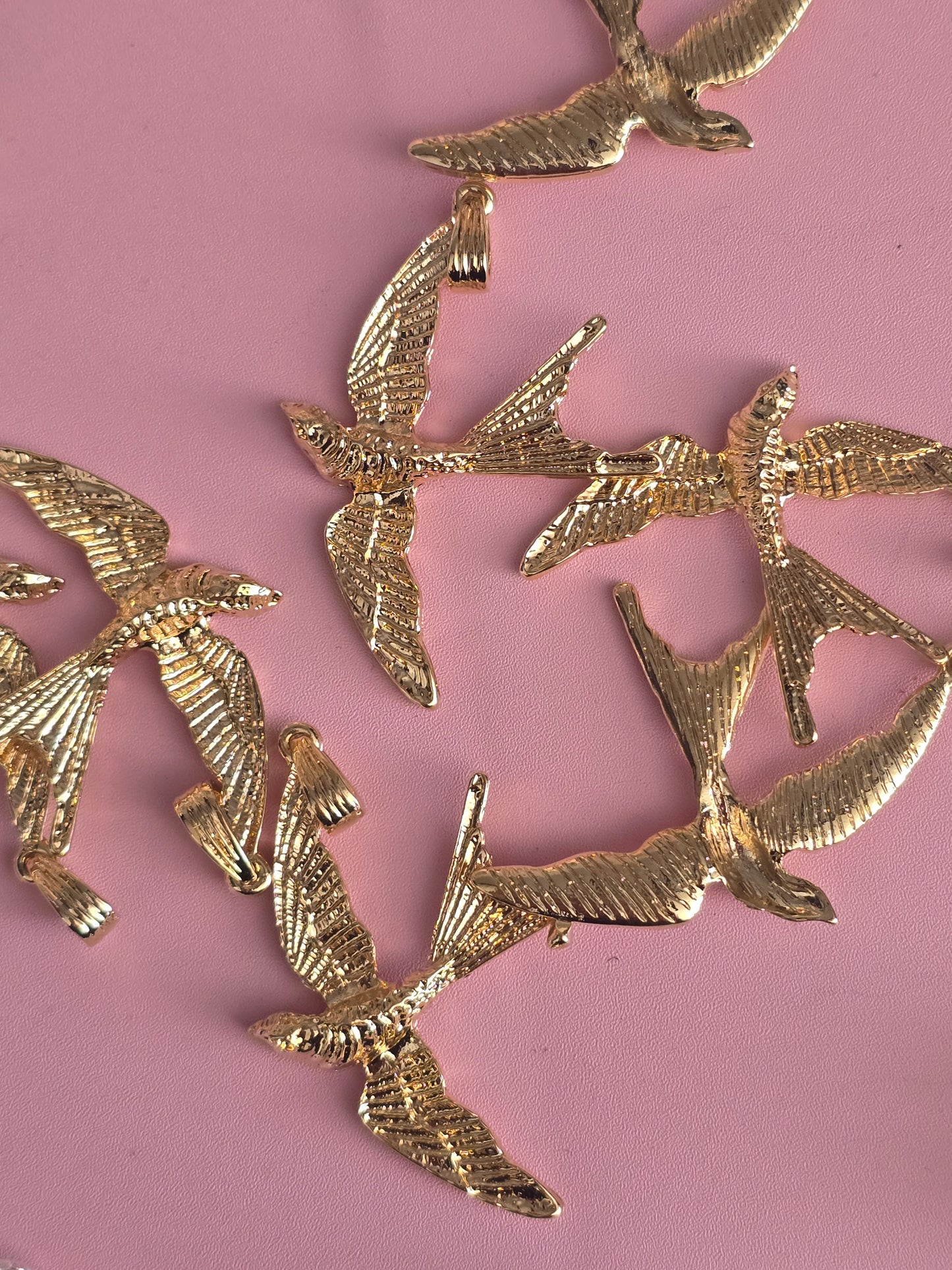GOLONDRINA charm