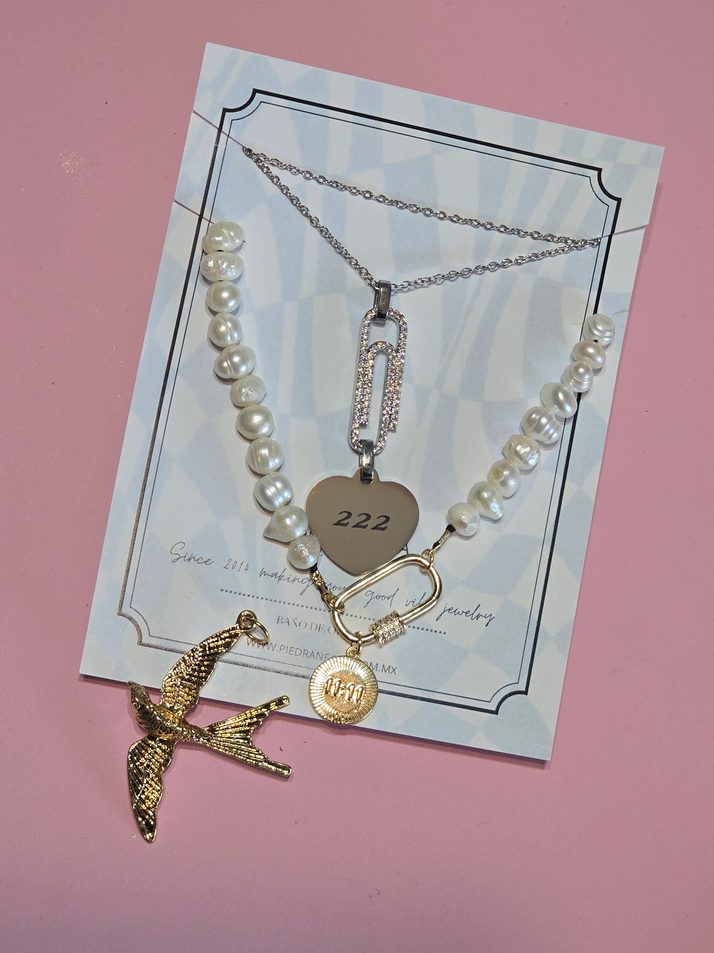 GOLONDRINA charm